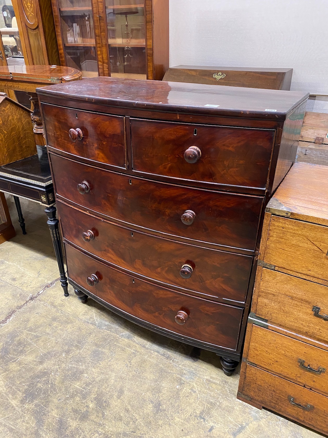 An early Victorian mahogany bow fronted chest of drawers, width 100cm, depth 49cm, height 121cm